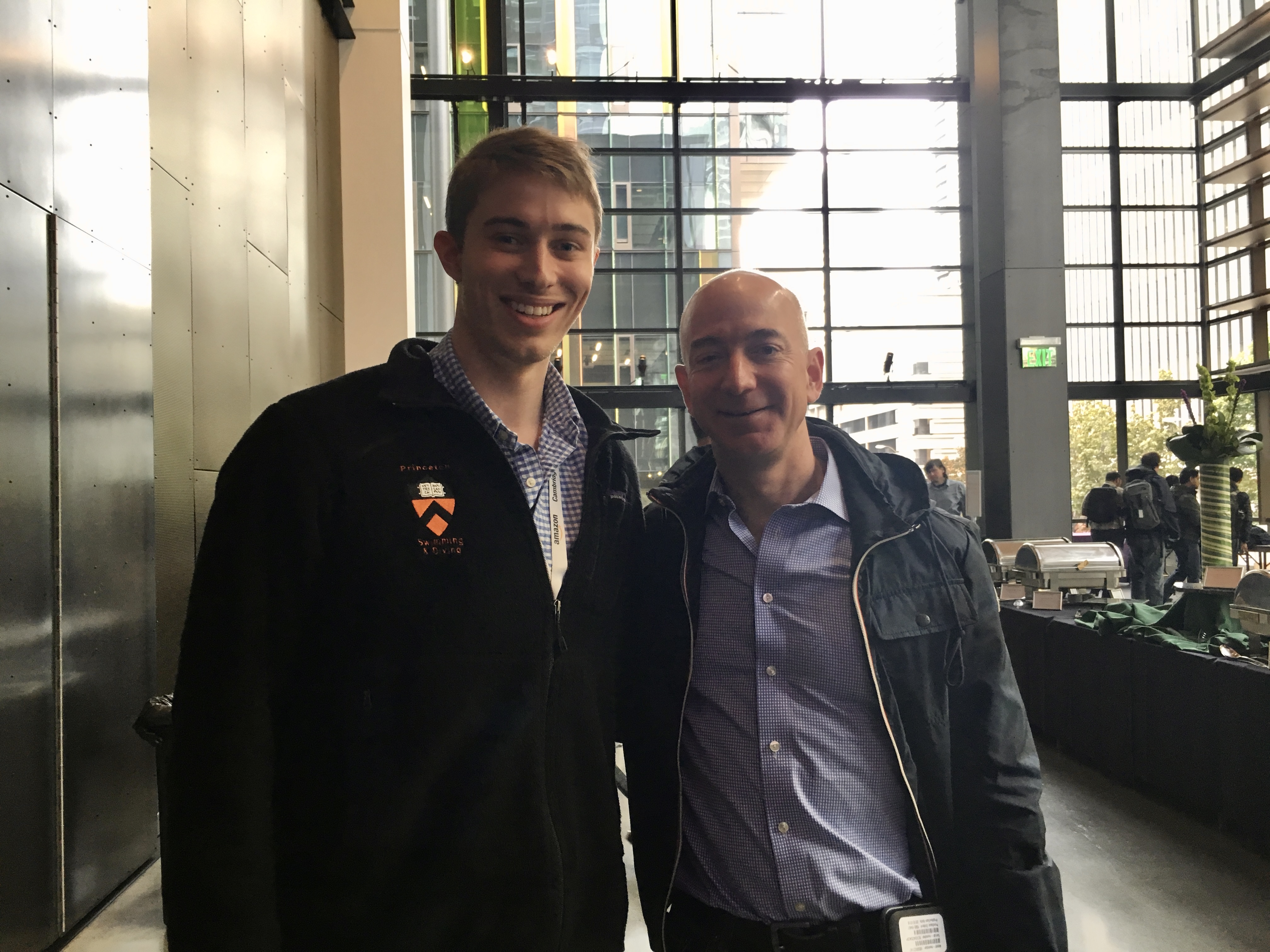David Paulk and Jeff Bezos at Amazon, David wearing his Princeton Swimming jacket